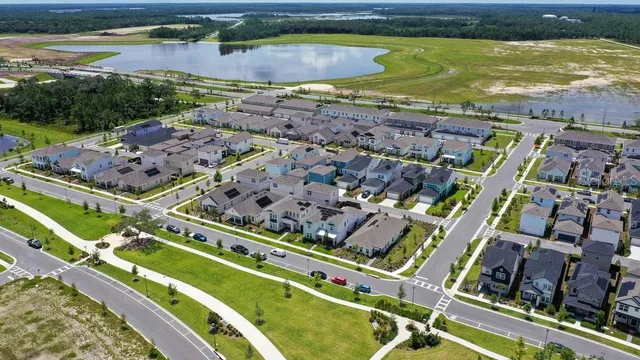 a view of a city with a lake