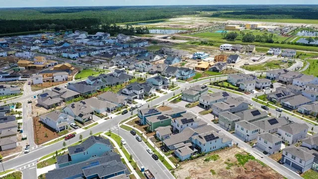 a view of a city with an ocean
