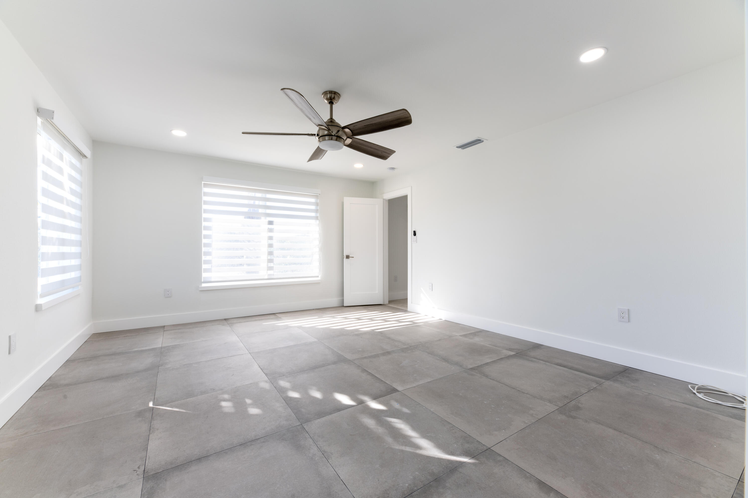 13757 Cocoanut Avenue Juno Beach, FL 33408 - Photo 11 of 31 a view of an empty room with a window