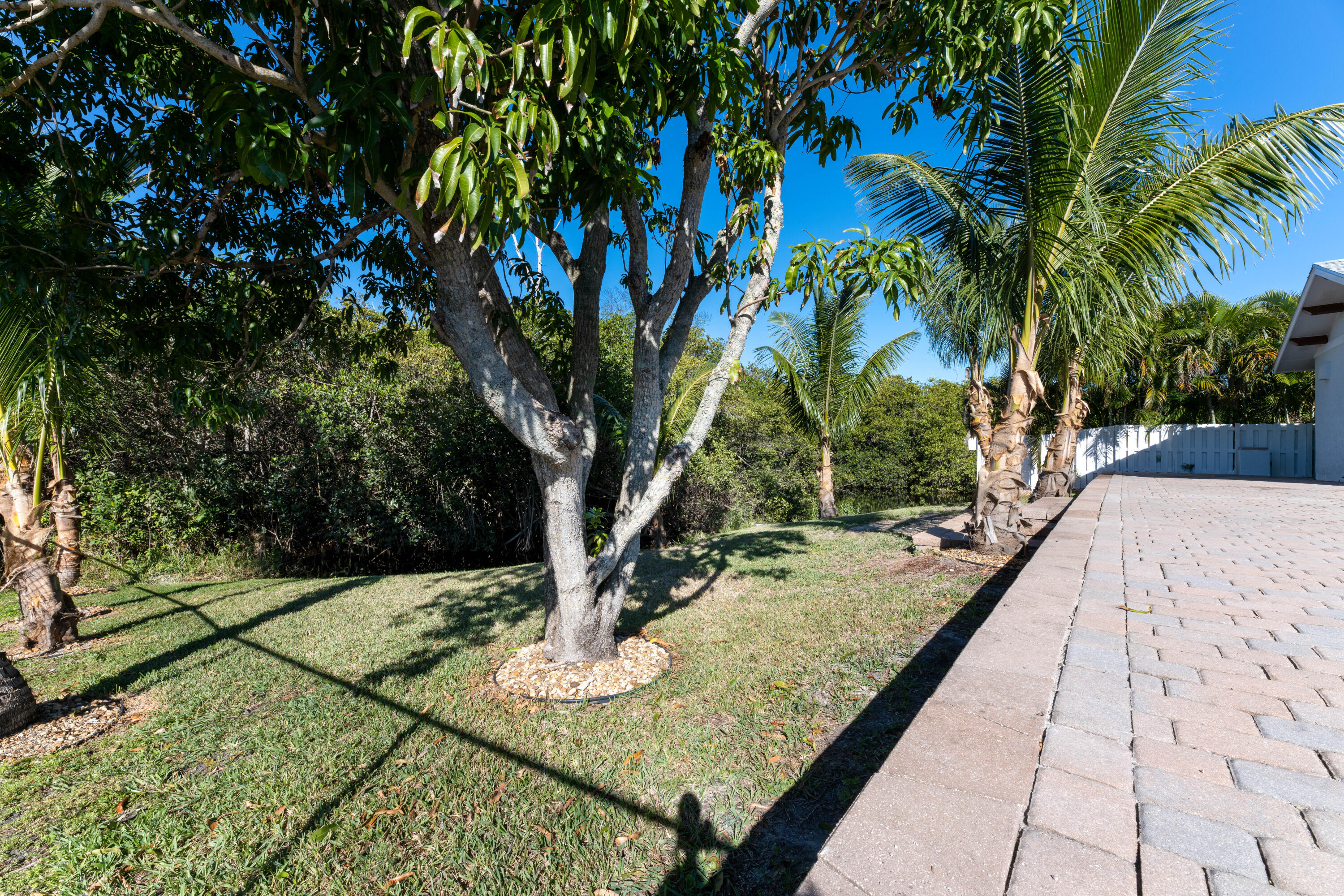 13757 Cocoanut Avenue Juno Beach, FL 33408 - Photo 25 of 31 a view of a backyard