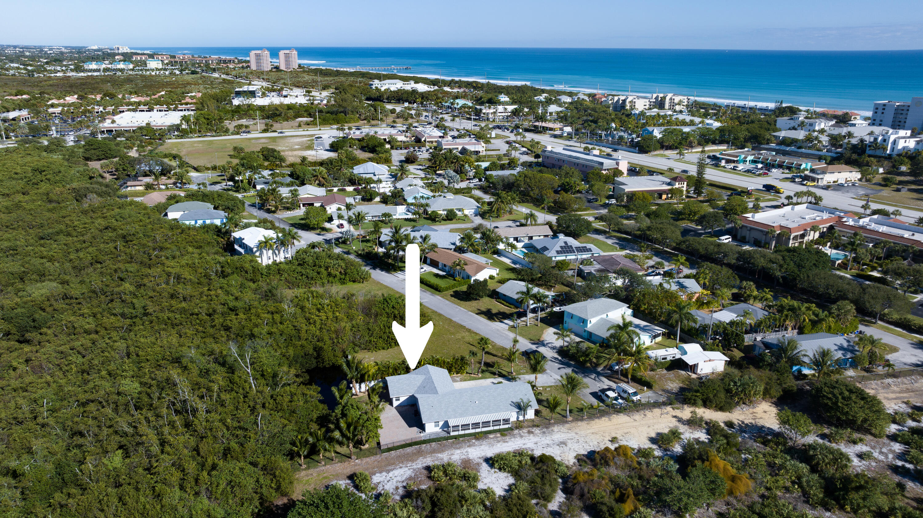 13757 Cocoanut Avenue Juno Beach, FL 33408 - Photo 28 of 31 an aerial view of residential houses with city view