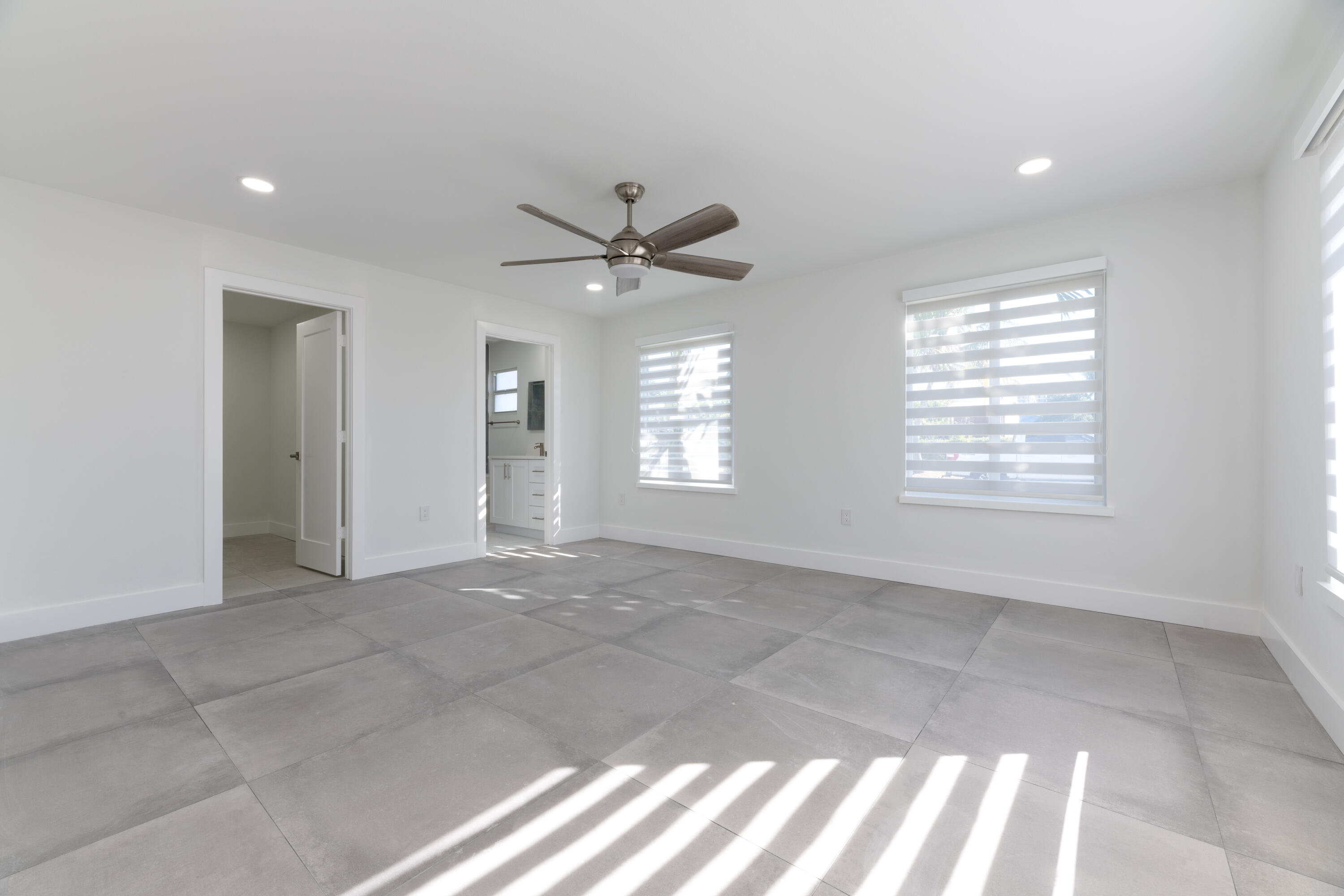 13757 Cocoanut Avenue Juno Beach, FL 33408 - Photo 10 of 31 a view of an empty room with a window