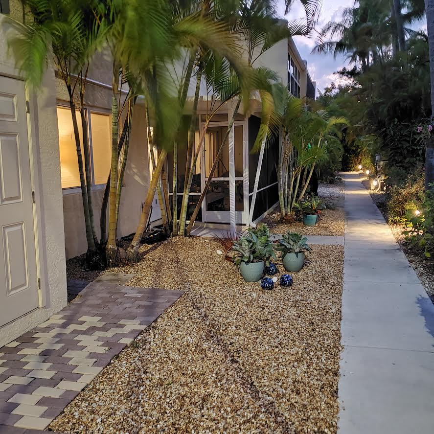 591 Sombrero Beach Road, Unit 8B Marathon, FL 33050 - Photo 11 of 43 a front view of a house with garden