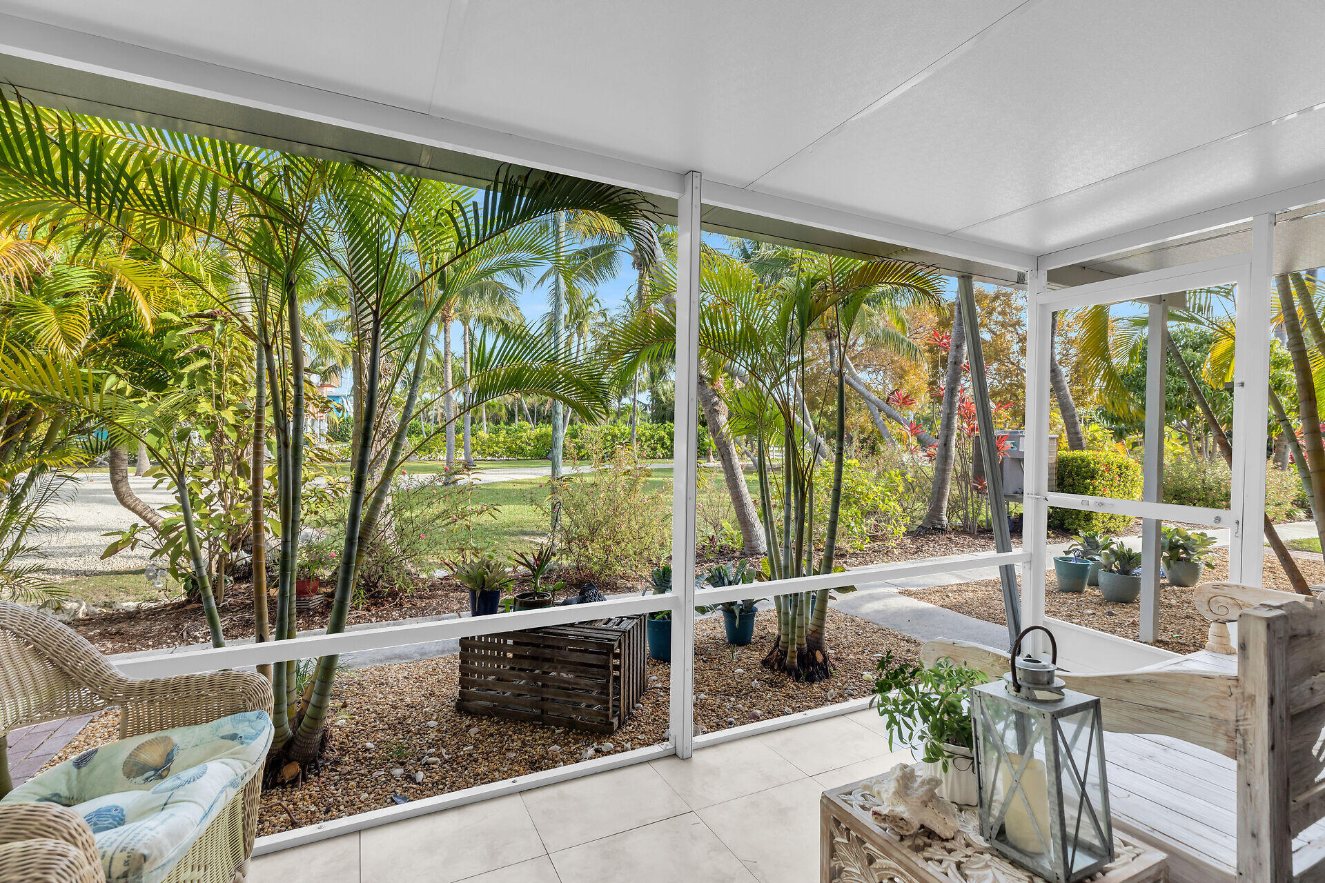 591 Sombrero Beach Road, Unit 8B Marathon, FL 33050 - Photo 12 of 43 a living room with large windows