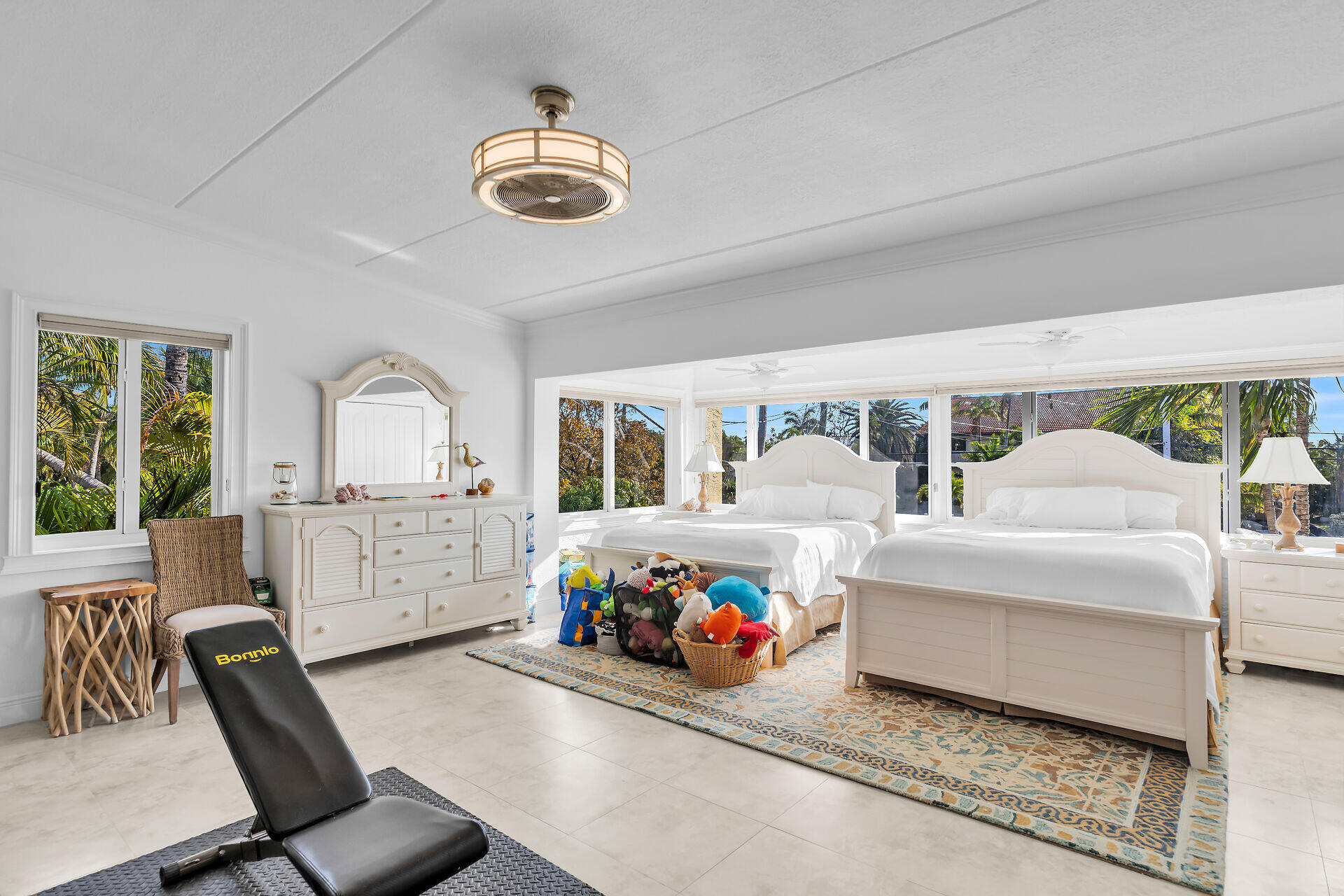 591 Sombrero Beach Road, Unit 8B Marathon, FL 33050 - Photo 18 of 43 a bedroom with furniture and a large window