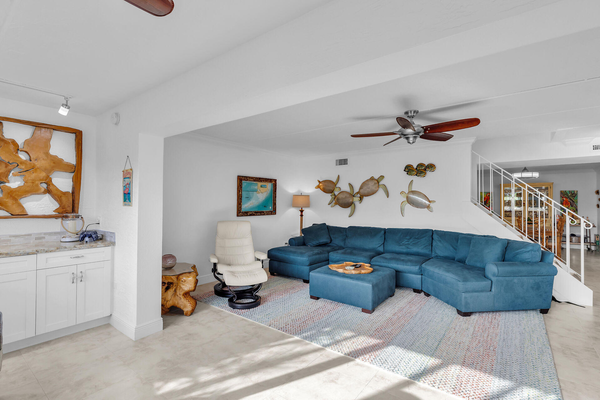 591 Sombrero Beach Road, Unit 8B Marathon, FL 33050 - Photo 23 of 43 a living room with furniture and a flat screen tv