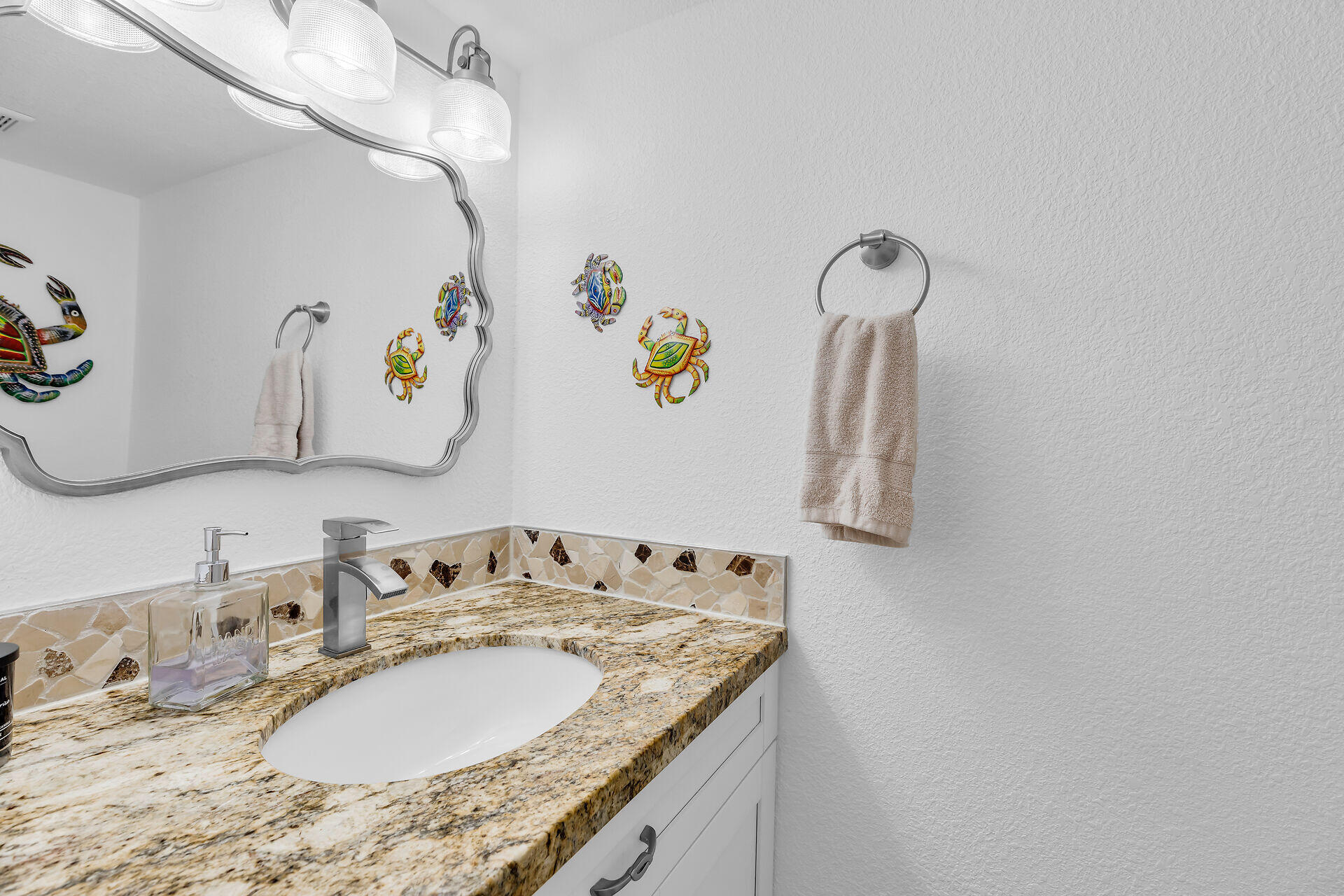 591 Sombrero Beach Road, Unit 8B Marathon, FL 33050 - Photo 37 of 43 a bathroom with a granite countertop sink and a mirror