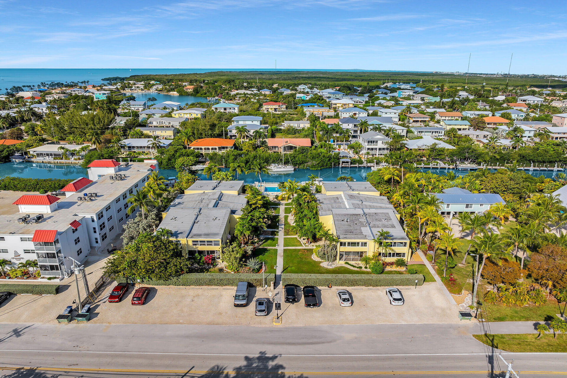 591 Sombrero Beach Road, Unit 8B Marathon, FL 33050 - Photo 6 of 43 an aerial view of residential houses with outdoor space