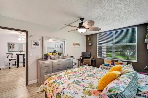 a bed room with a bed and furniture