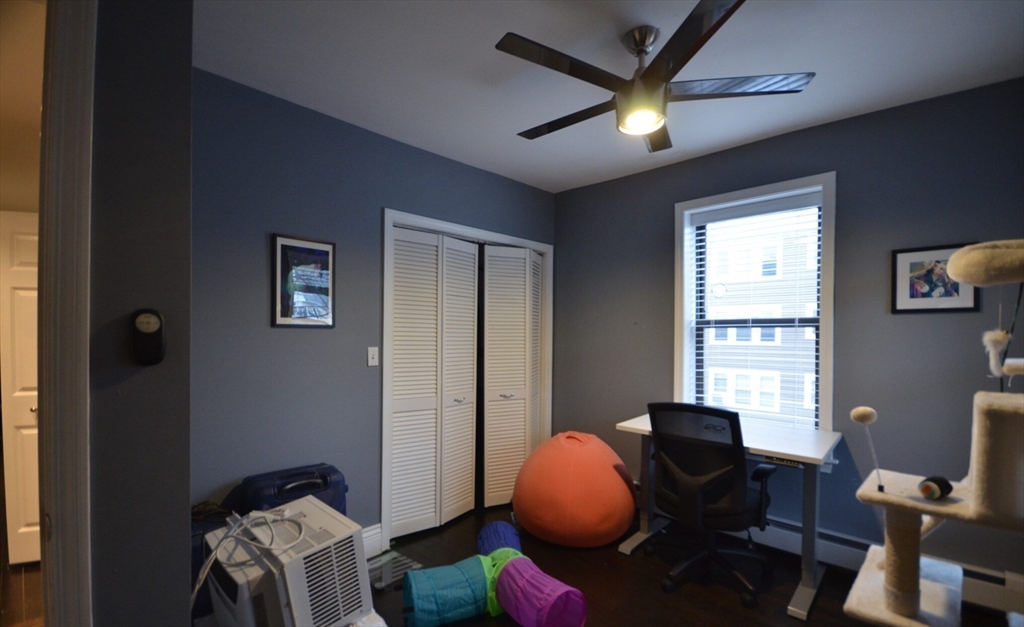 60 Florida Street, Unit 2 Boston, MA 02124 - Photo 20 of 25 a workspace with furniture and a window