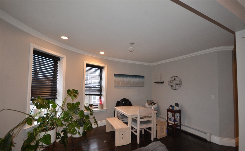 60 Florida Street, Unit 2 Boston, MA 02124 - Photo 6 of 25 a work room with furniture and a window