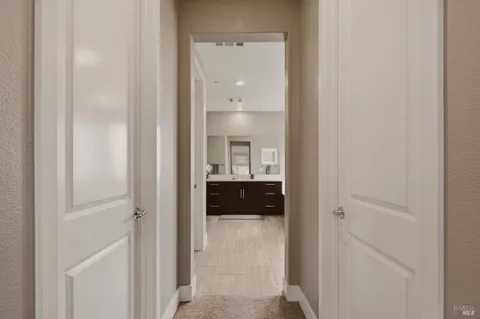 a room with a sink and cabinets