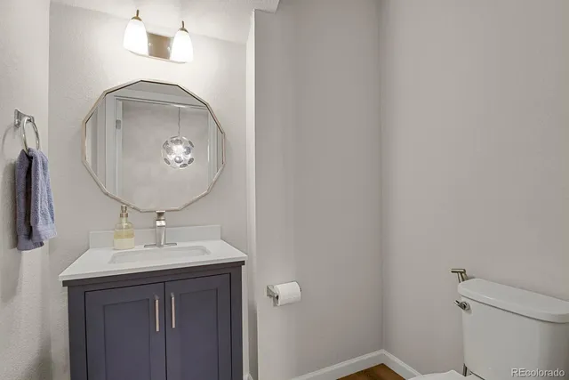 a bathroom with a sink and mirror