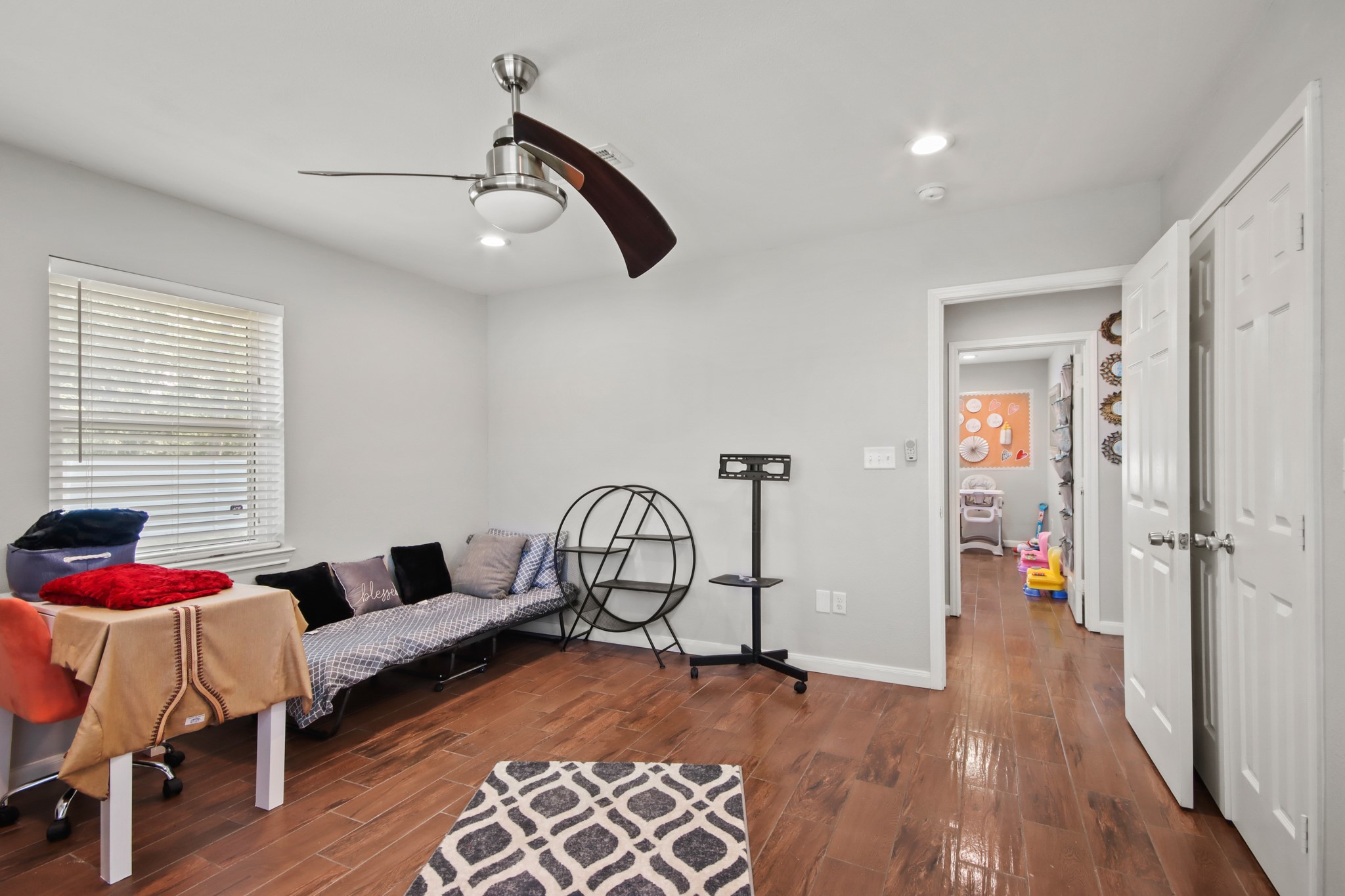5302 Treaschwig Road Spring, TX 77373 - Photo 23 of 50 a living room with furniture and wooden floor