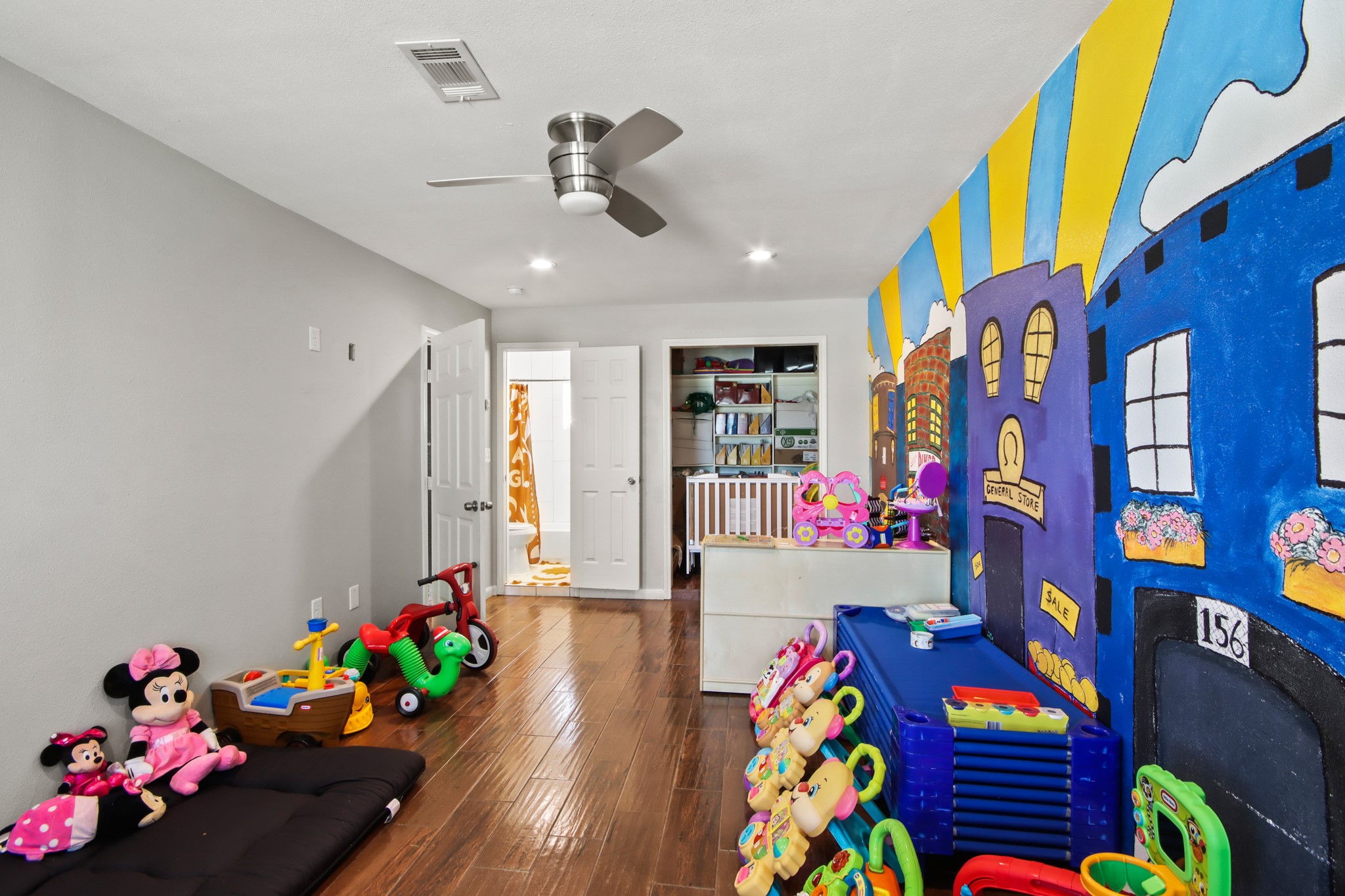 5302 Treaschwig Road Spring, TX 77373 - Photo 34 of 50 a play room with toys and a book shelf