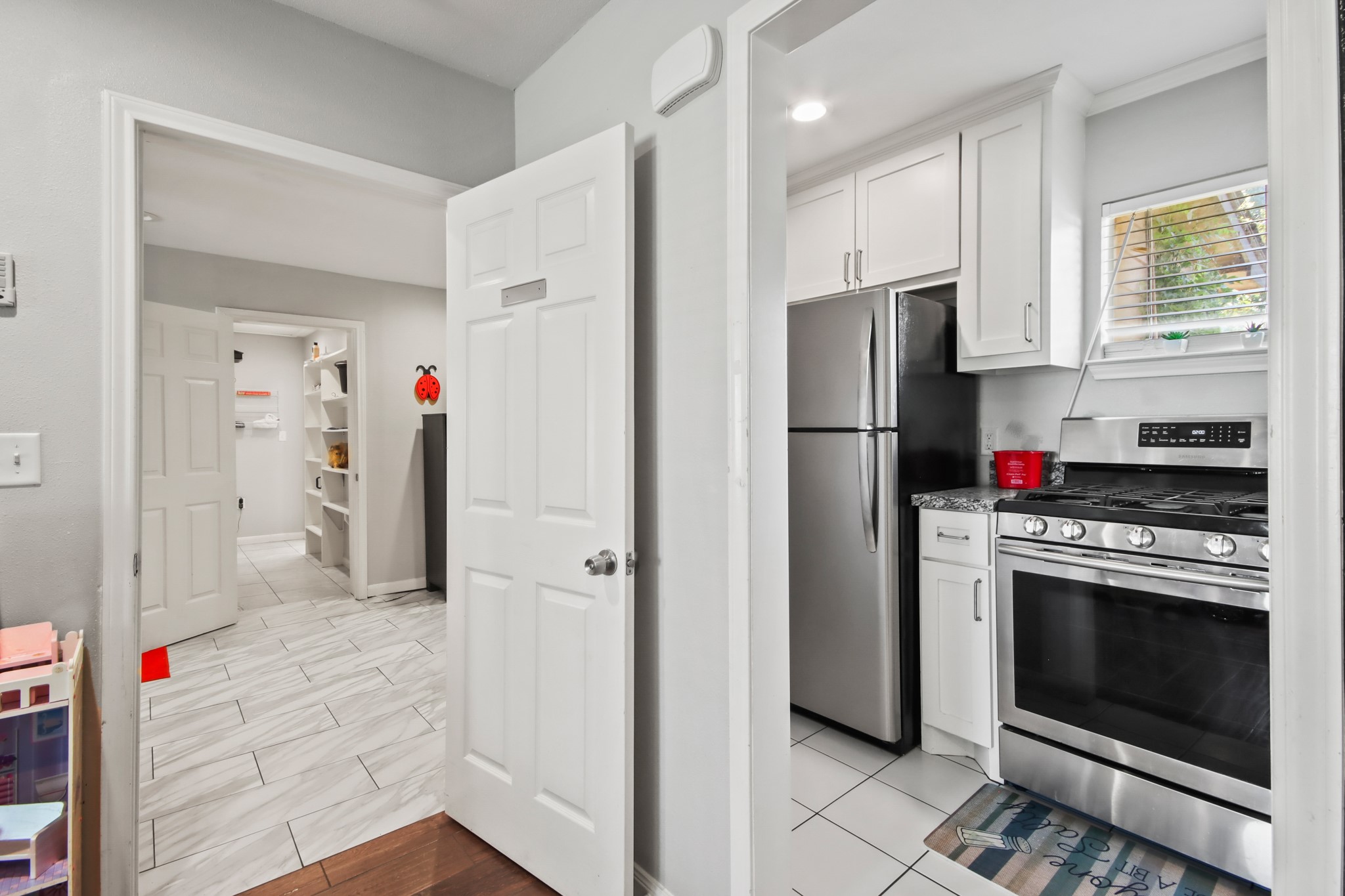 5302 Treaschwig Road Spring, TX 77373 - Photo 37 of 50 a kitchen with stainless steel appliances a refrigerator sink and cabinets