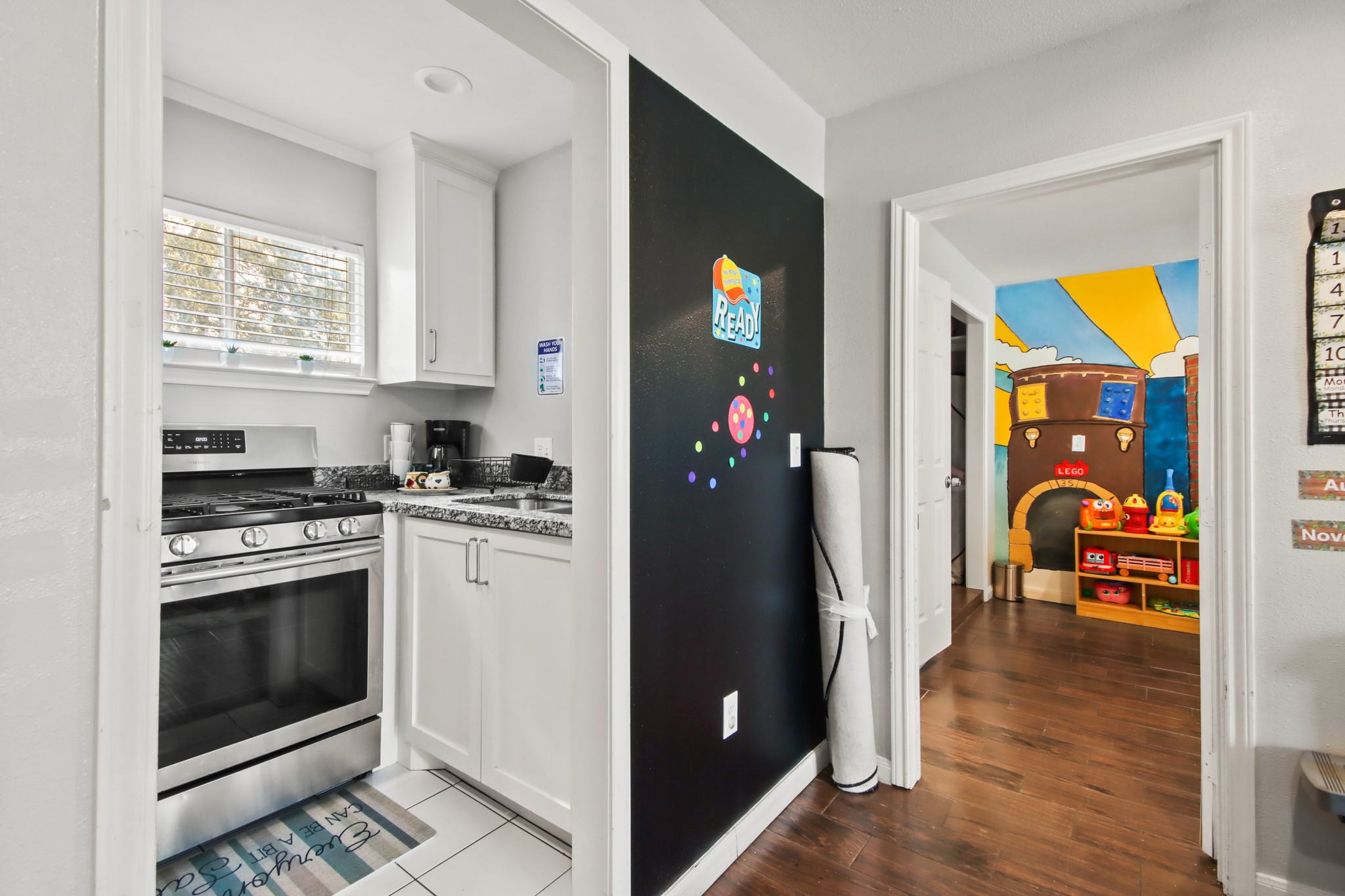 5302 Treaschwig Road Spring, TX 77373 - Photo 38 of 50 a kitchen with stainless steel appliances granite countertop a refrigerator and a stove top oven