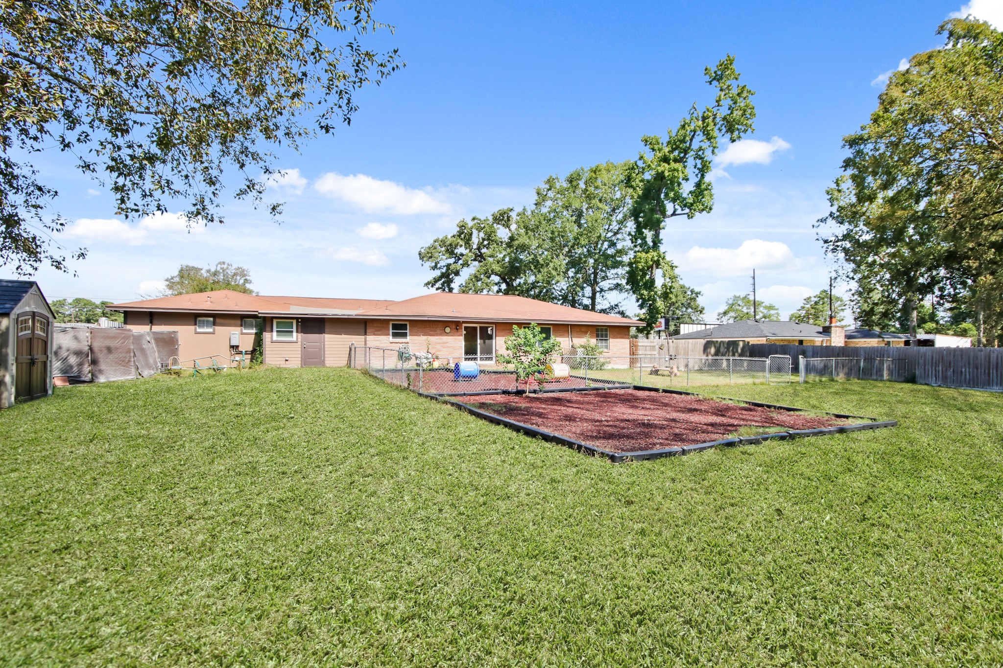 5302 Treaschwig Road Spring, TX 77373 - Photo 7 of 50 a view of a house with a yard and sitting area