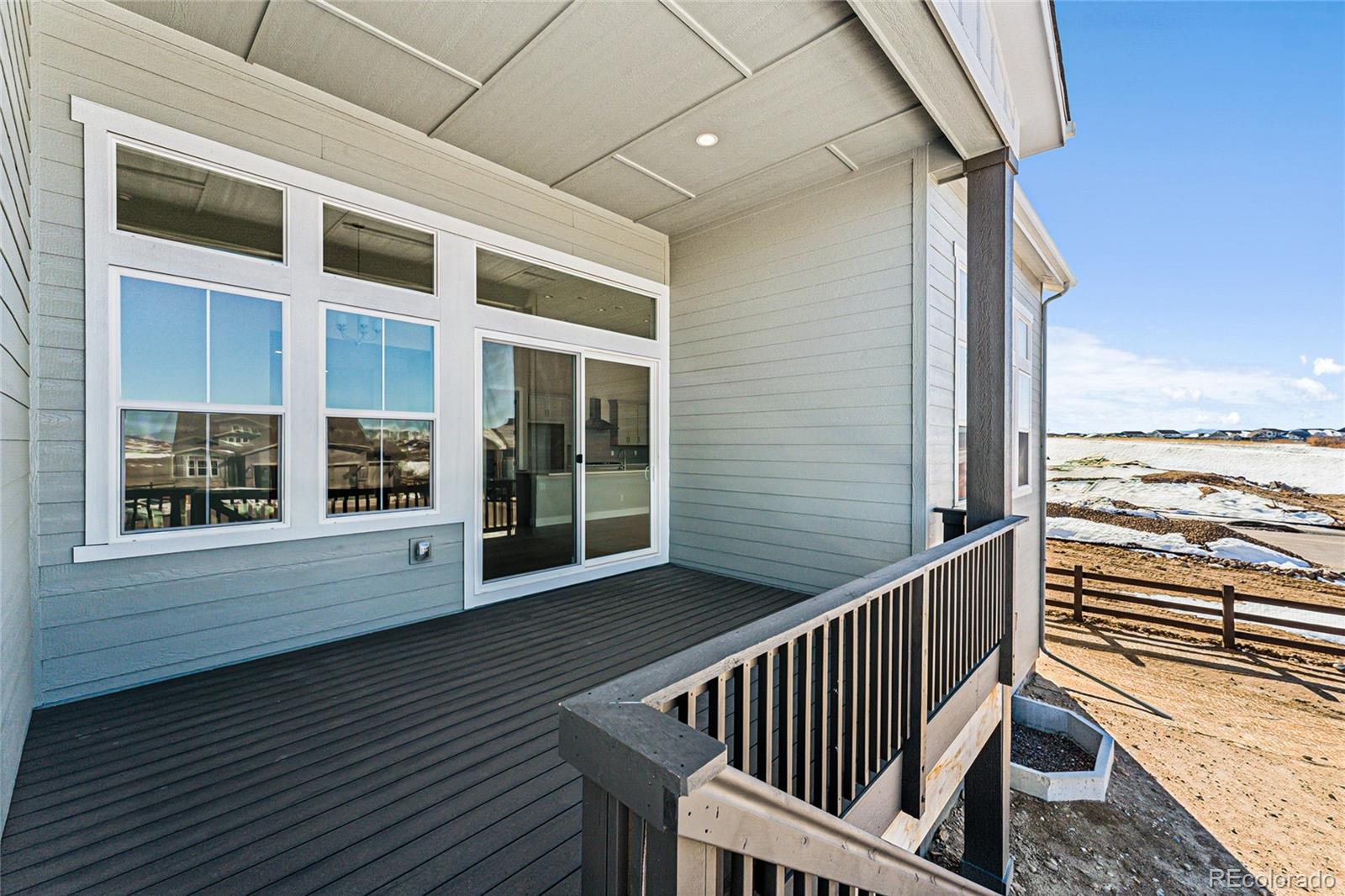 3877 Freestone Point Castle Rock, CO 80108 - Photo 14 of 48 a view of balcony with wooden floor