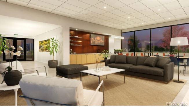 3877 Freestone Point Castle Rock, CO 80108 - Photo 45 of 48 a living room with furniture and a large window