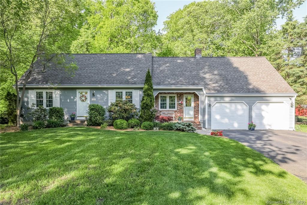 20 Longate Road Clinton, CT 06413 - Photo 1 of 1 a front view of a house with a yard and garage