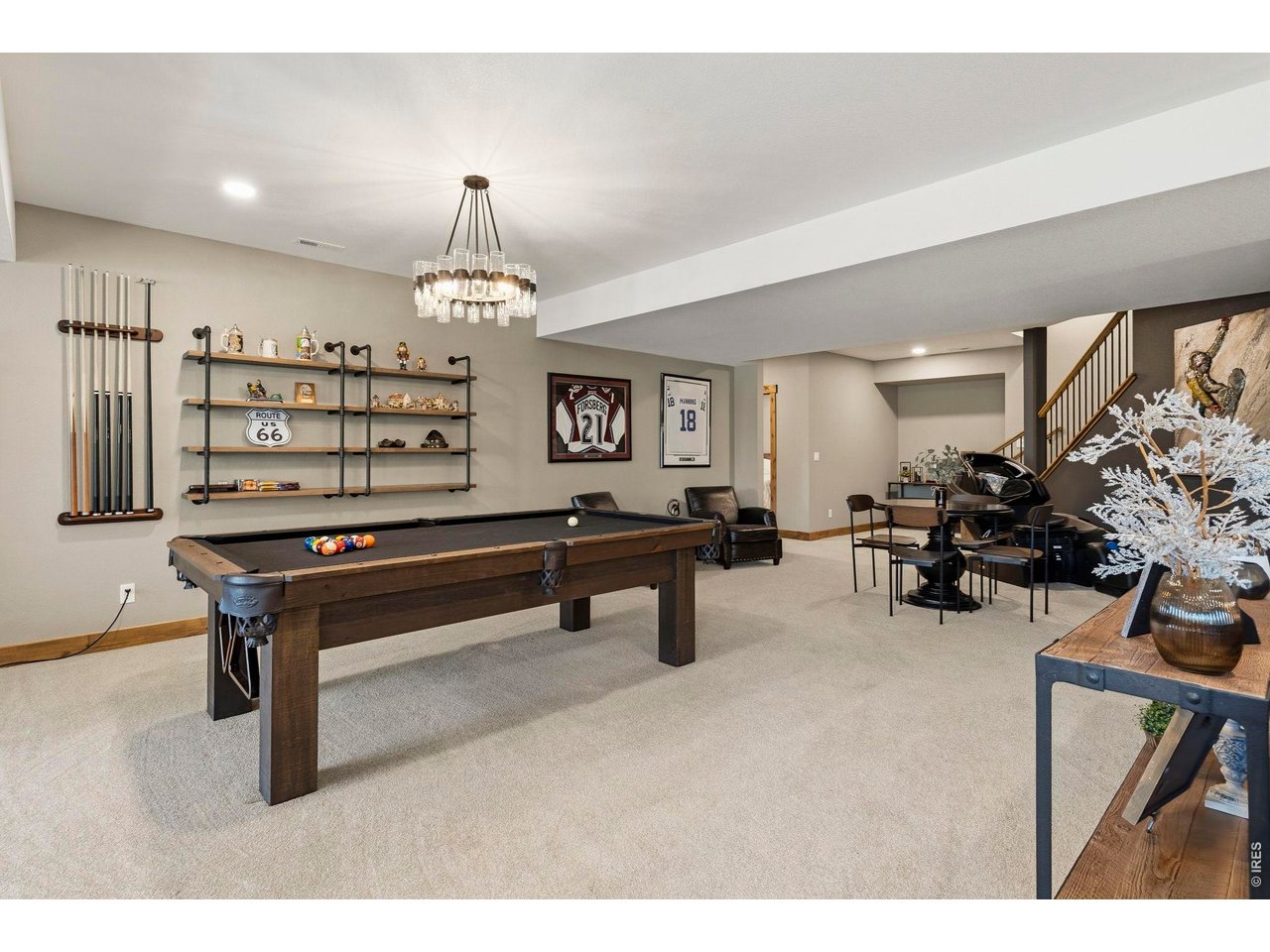2734 Southwind Road Berthoud, CO 80513 - Photo 39 of 50 Spacious Rec room for activities - Pool table, card table and gym or sitting room - there is also 36x24 storage and mechanical room
