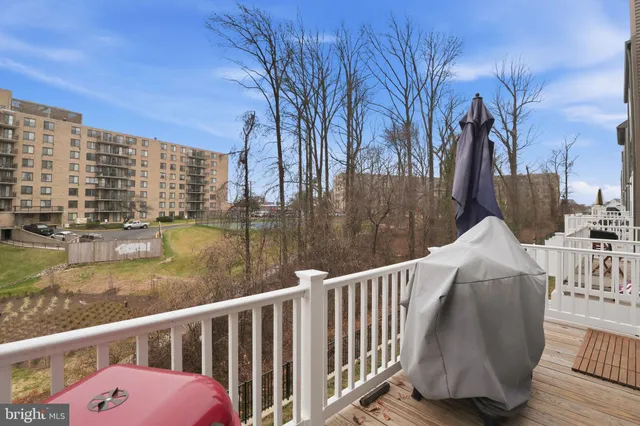 a view of balcony with furniture