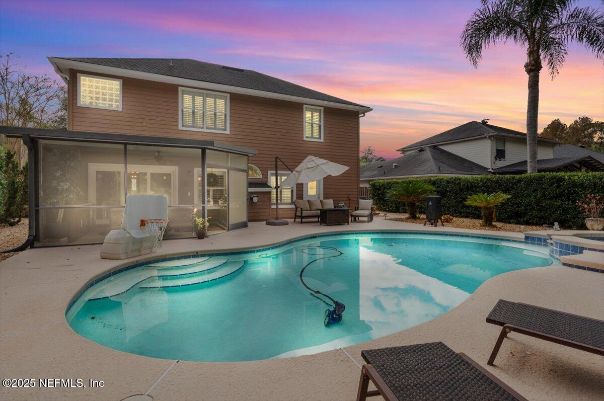 252 Crooked Court St. Johns, FL 32259 - Photo 1 of 72 a view of a house with swimming pool and a porch