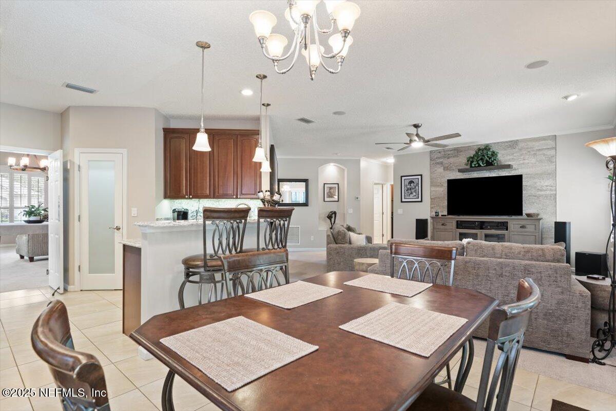 252 Crooked Court St. Johns, FL 32259 - Photo 17 of 72 a view of a dining room with furniture