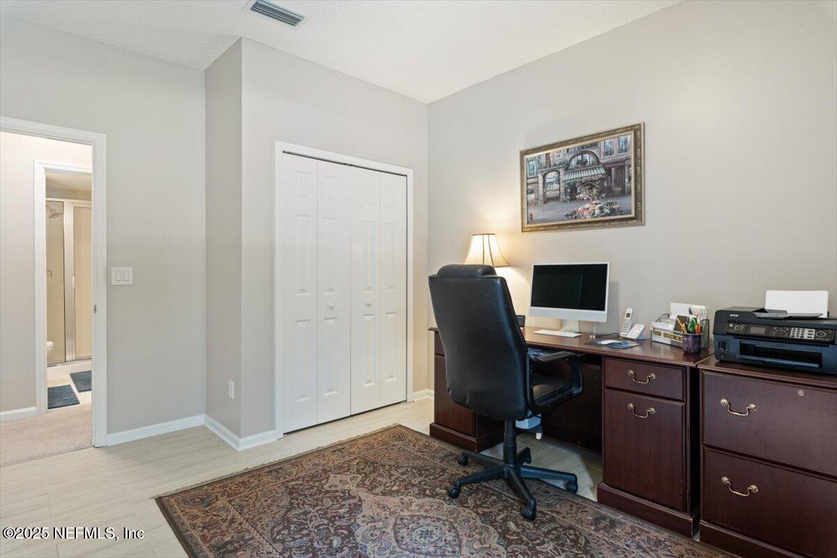 252 Crooked Court St. Johns, FL 32259 - Photo 20 of 72 a view of a workspace with furniture and a window