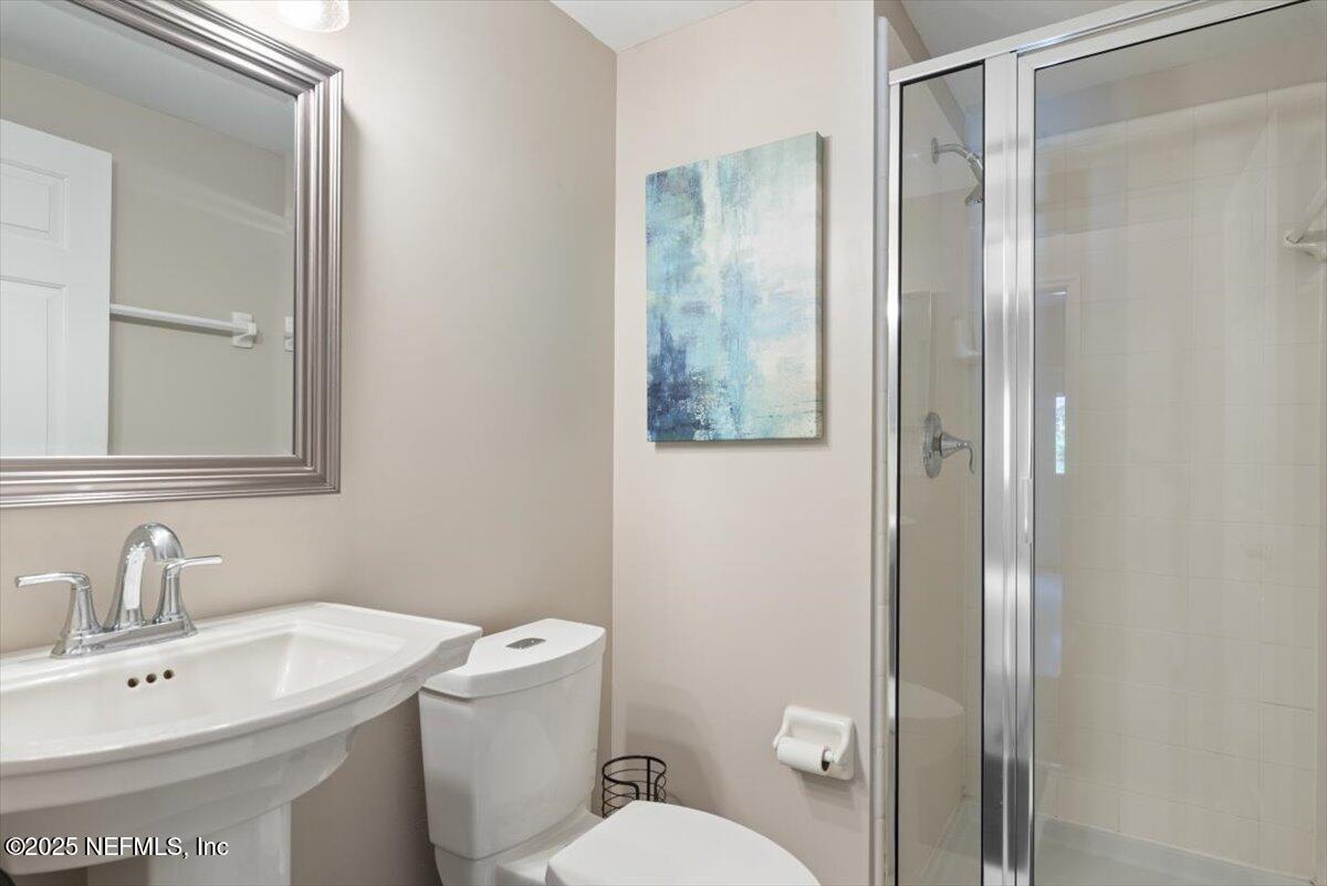 252 Crooked Court St. Johns, FL 32259 - Photo 22 of 72 a bathroom with a sink toilet and shower