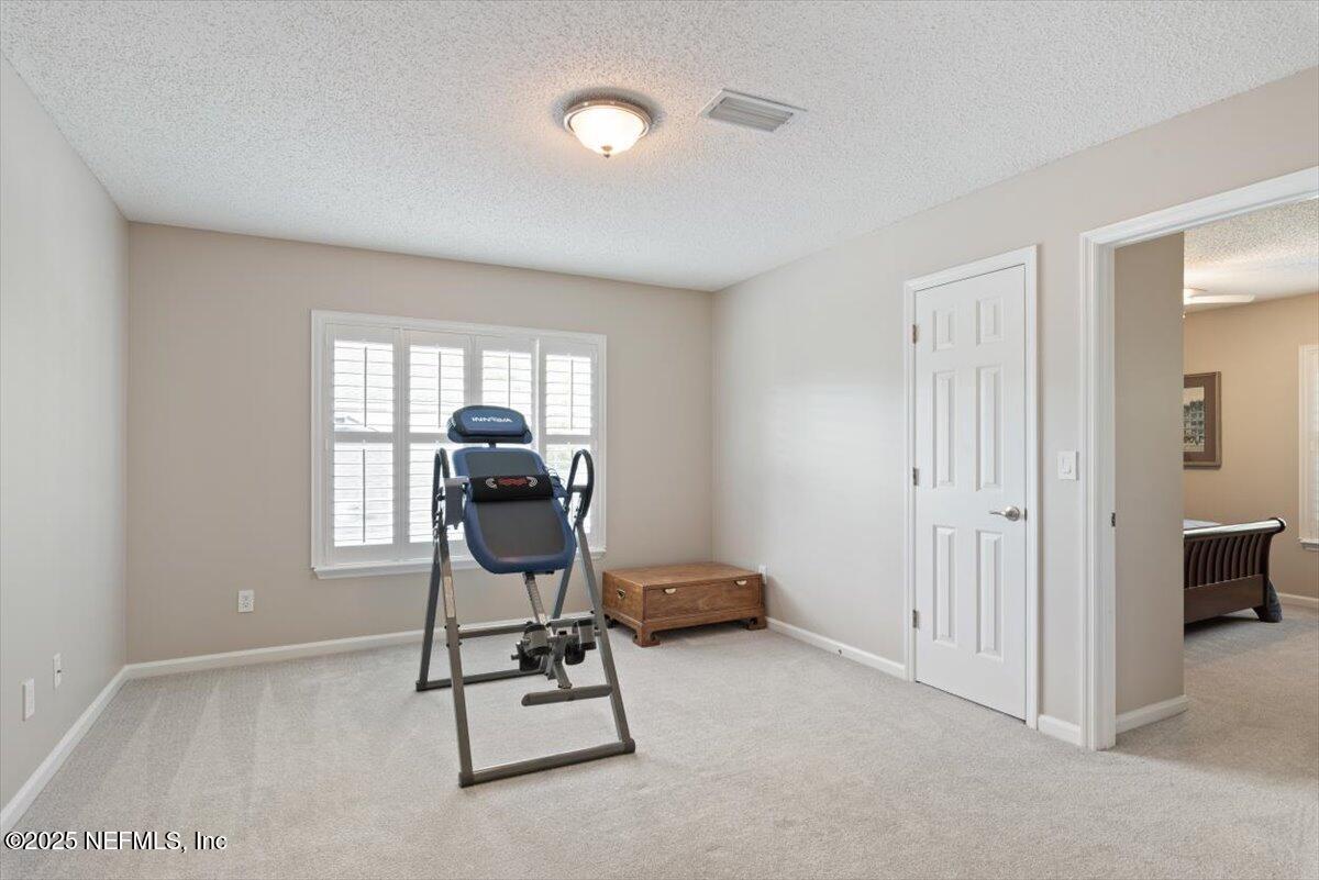 252 Crooked Court St. Johns, FL 32259 - Photo 30 of 72 a workspace with furniture and a window