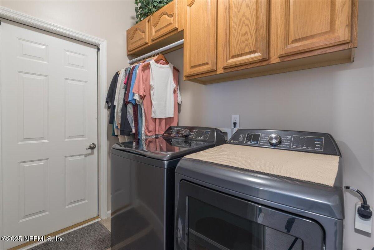 252 Crooked Court St. Johns, FL 32259 - Photo 37 of 72 a utility room with dryer and washer