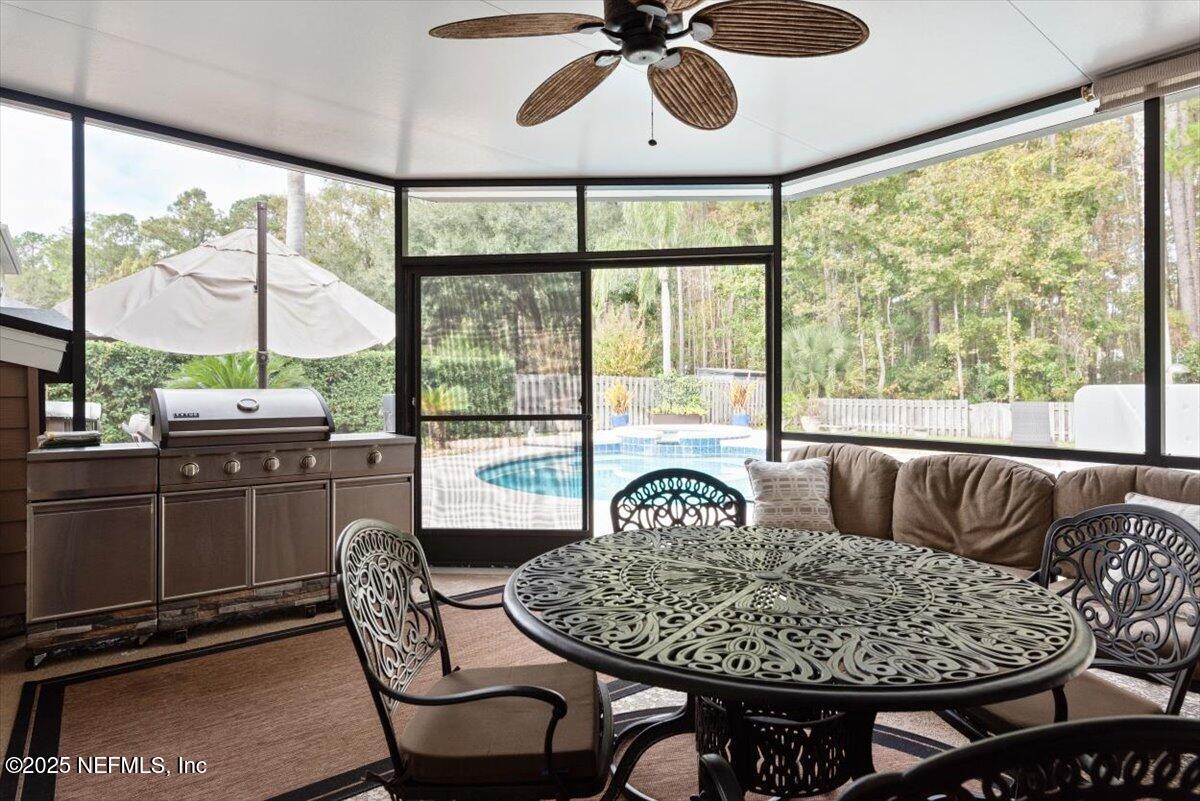 252 Crooked Court St. Johns, FL 32259 - Photo 40 of 72 a living room with furniture and a large window