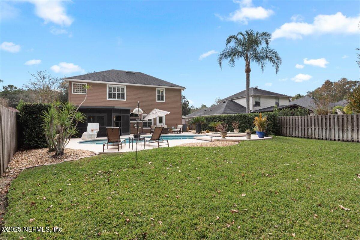 252 Crooked Court St. Johns, FL 32259 - Photo 46 of 72 a front view of a house with garden