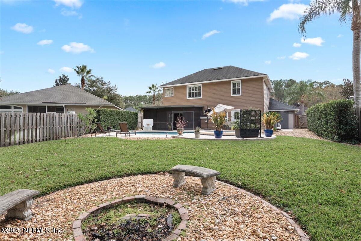 252 Crooked Court St. Johns, FL 32259 - Photo 48 of 72 a front view of a house with a yard and garage