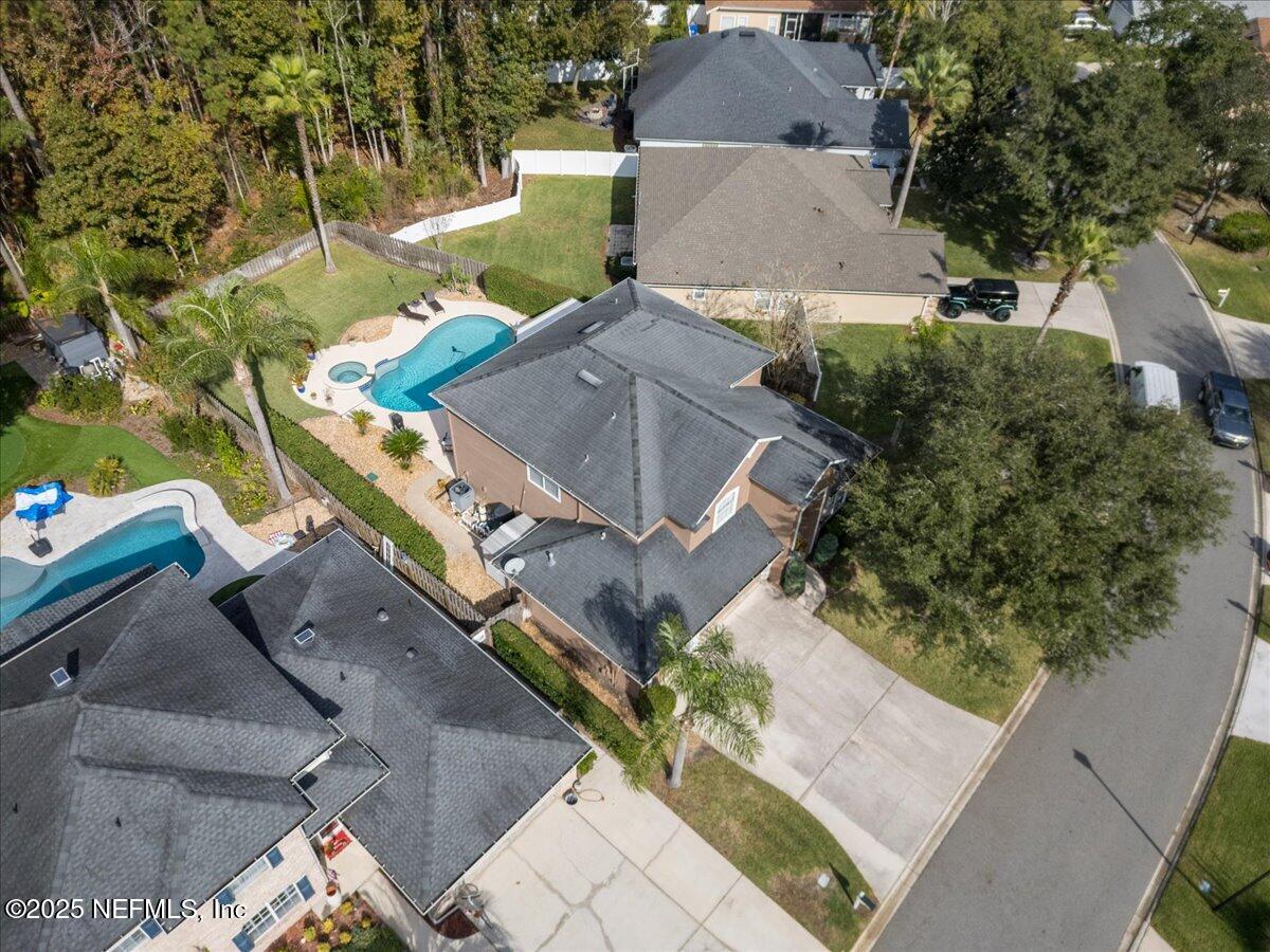 252 Crooked Court St. Johns, FL 32259 - Photo 55 of 72 an aerial view of a house with a yard and trees