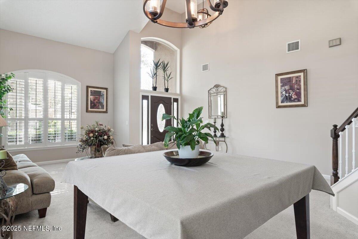 252 Crooked Court St. Johns, FL 32259 - Photo 10 of 72 a dining room with furniture and window