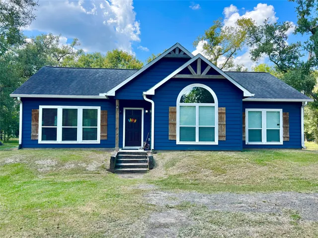 a house view with a garden space