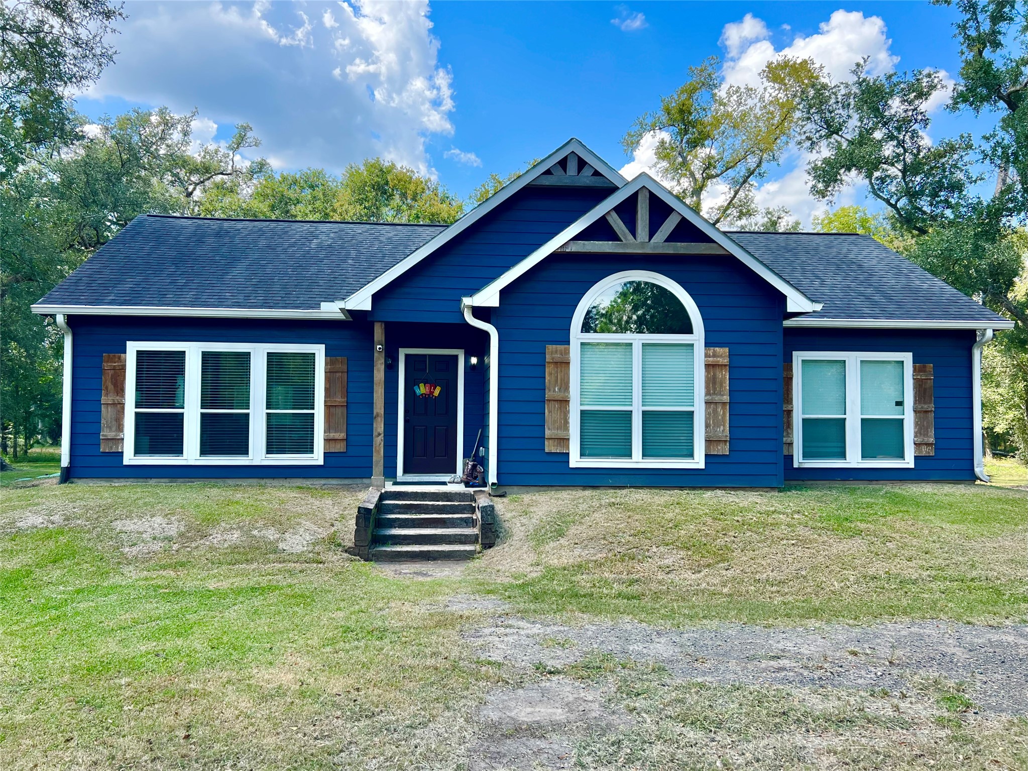 a house view with a garden space