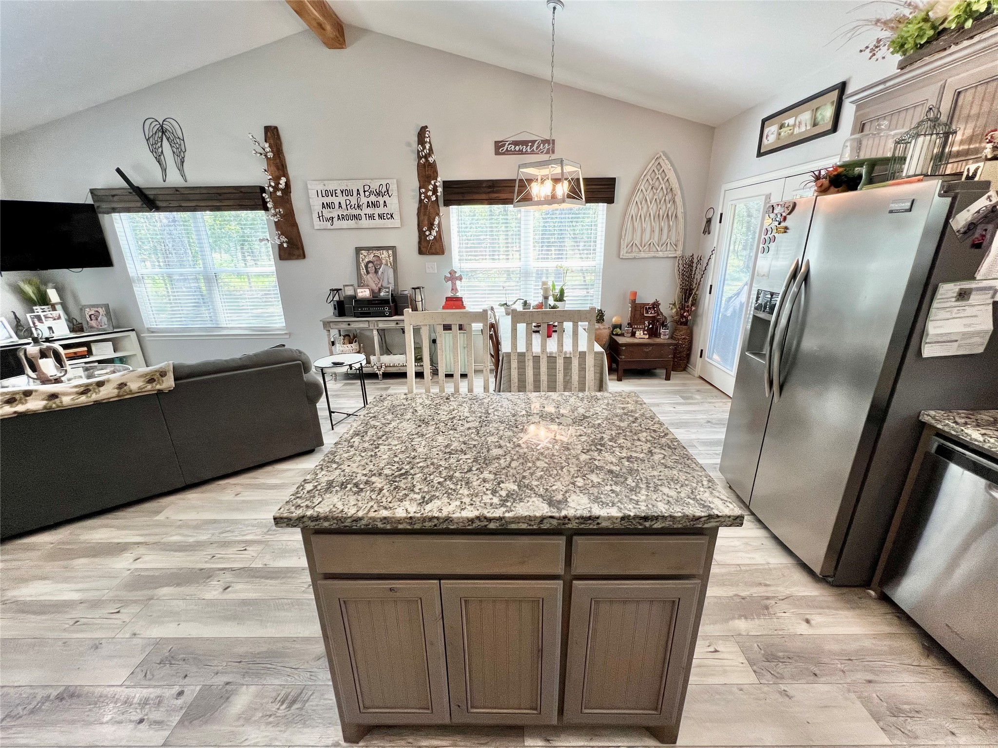 22740 Brazos Circle Damon, TX 77430 - Photo 14 of 30 a kitchen with stainless steel appliances granite countertop sink stove refrigerator and cabinets