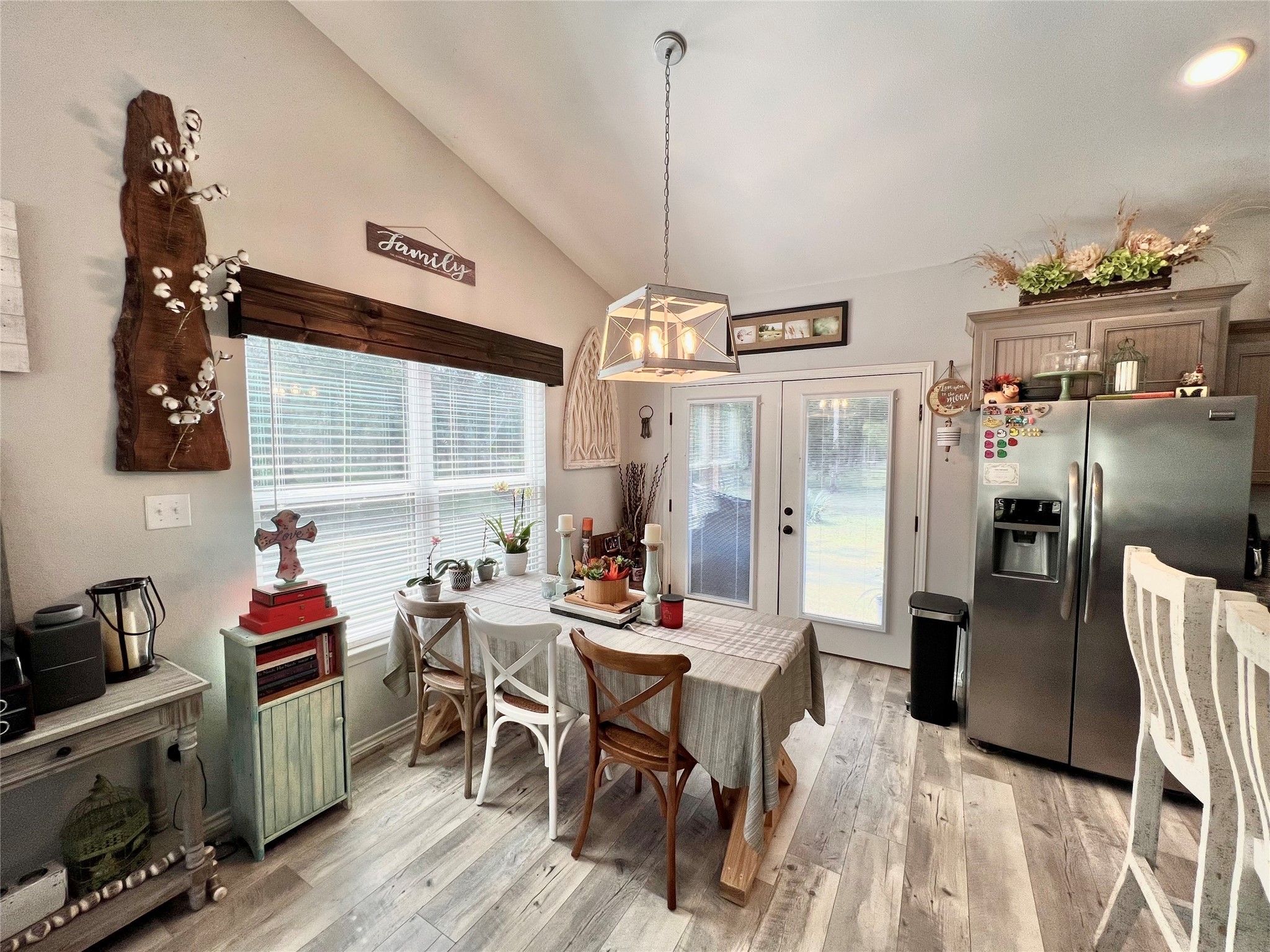 22740 Brazos Circle Damon, TX 77430 - Photo 15 of 30 a view of a dining room with furniture window and wooden floor