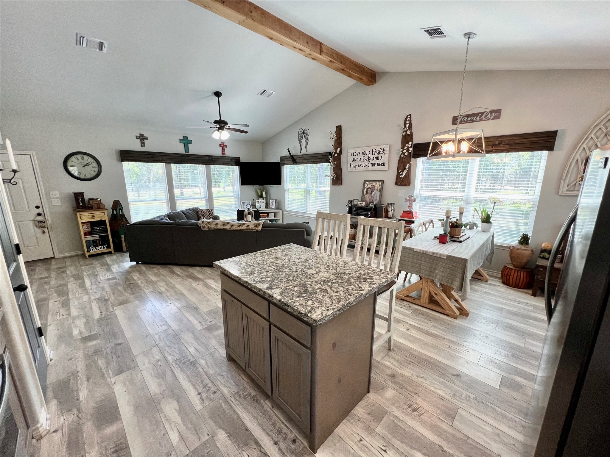 22740 Brazos Circle Damon, TX 77430 - Photo 16 of 30 a living room with furniture and a wooden floor