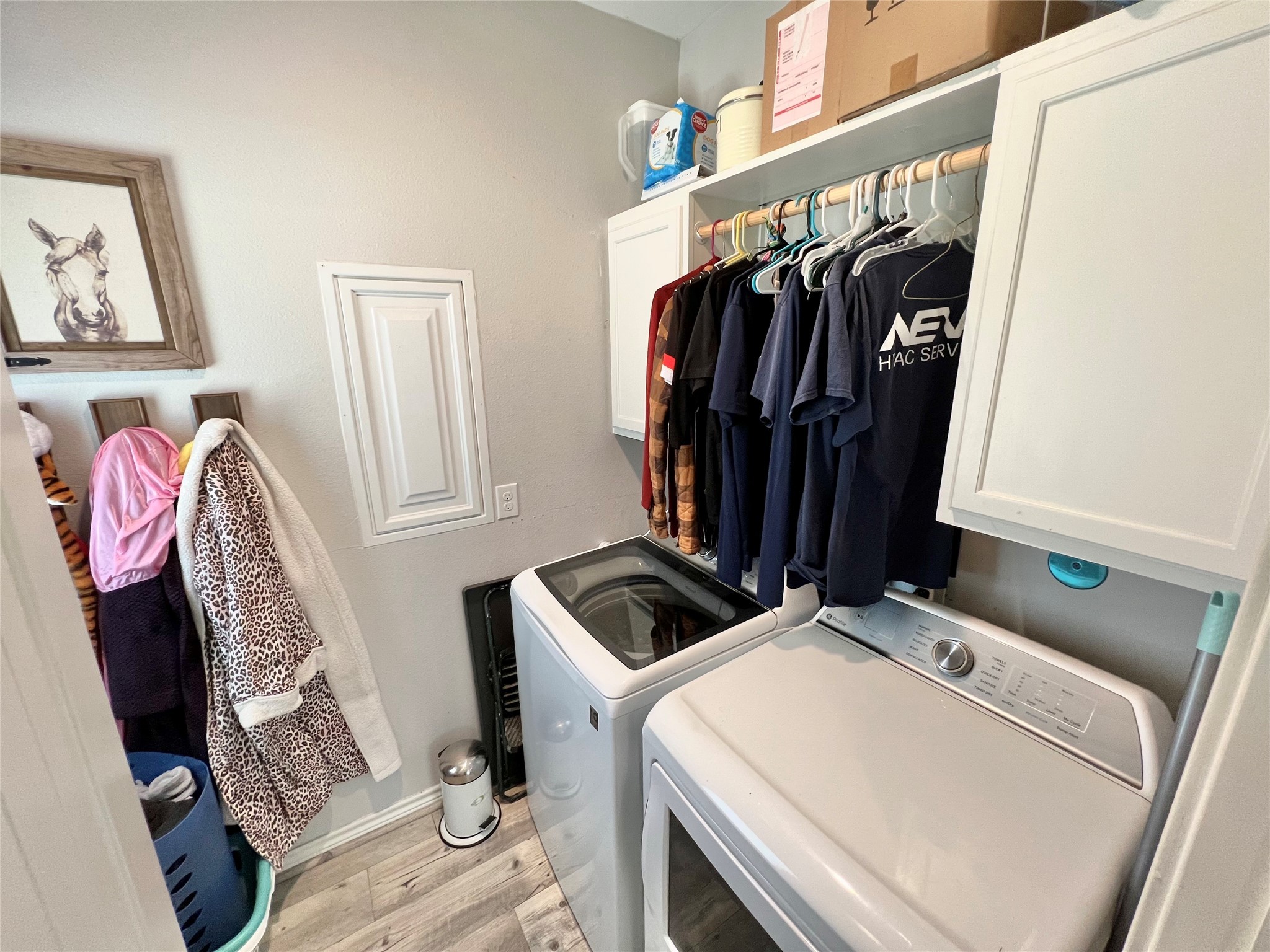 22740 Brazos Circle Damon, TX 77430 - Photo 18 of 30 a view of walk in closet with clothes and shoes