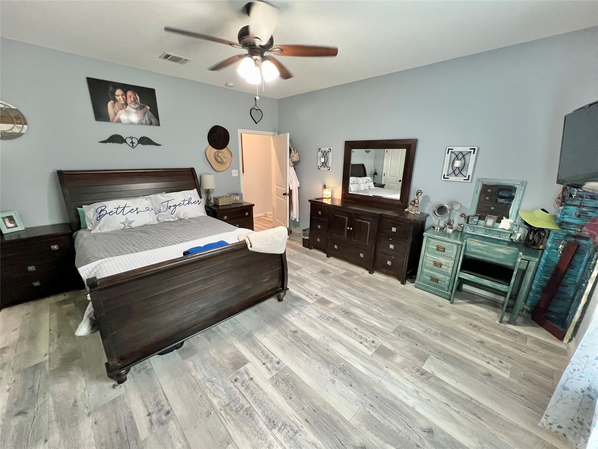 22740 Brazos Circle Damon, TX 77430 - Photo 23 of 30 a living room with furniture and a flat screen tv