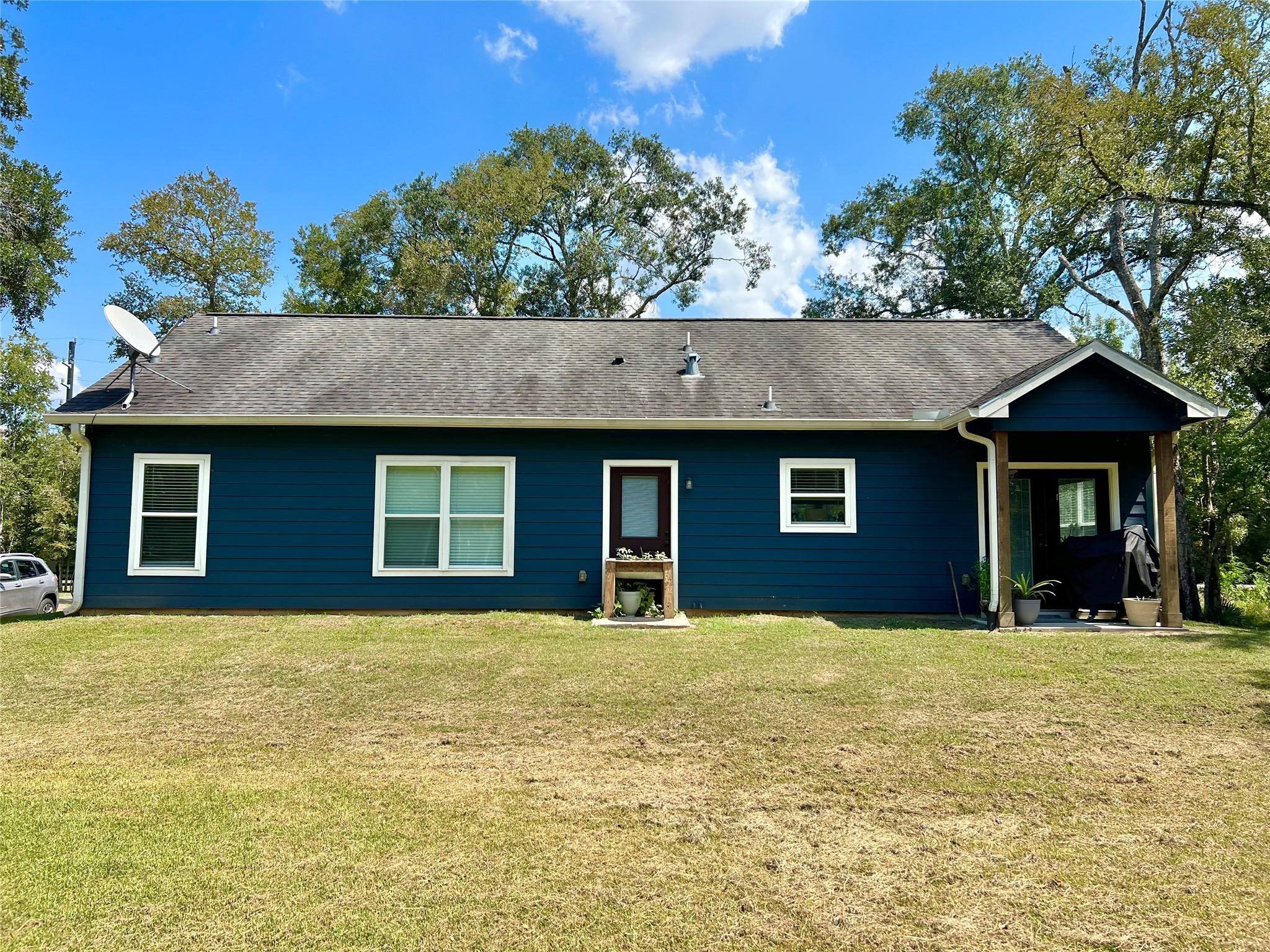 22740 Brazos Circle Damon, TX 77430 - Photo 28 of 30 a view of a house with a yard