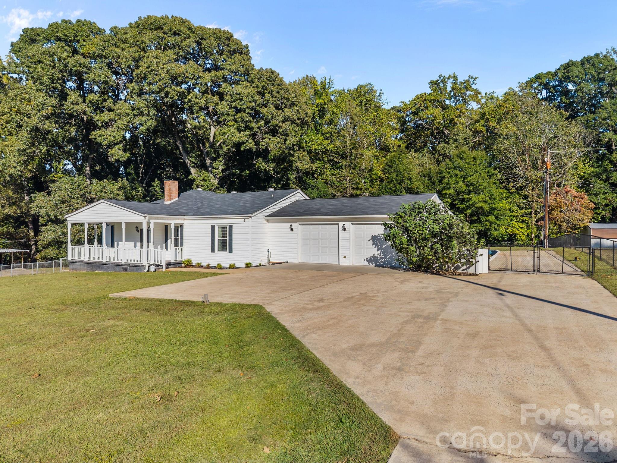 1614 Old Nation Road Fort Mill, SC 29715 - Photo 7 of 47 a front view of a house with a garden