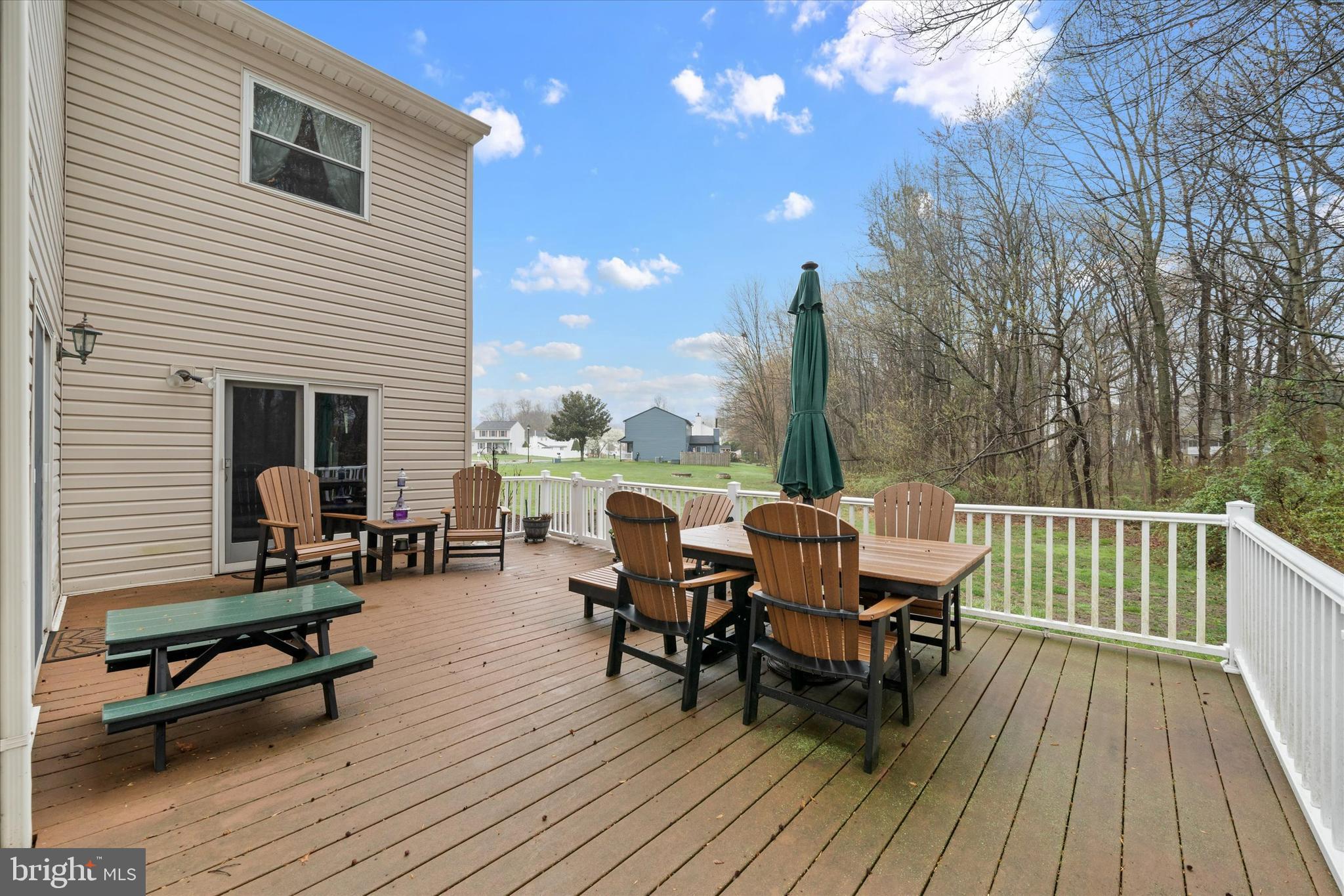 710 Fox Chase Circle Bear, DE 19701 - Photo 26 of 55 a balcony with wooden floor table and chairs