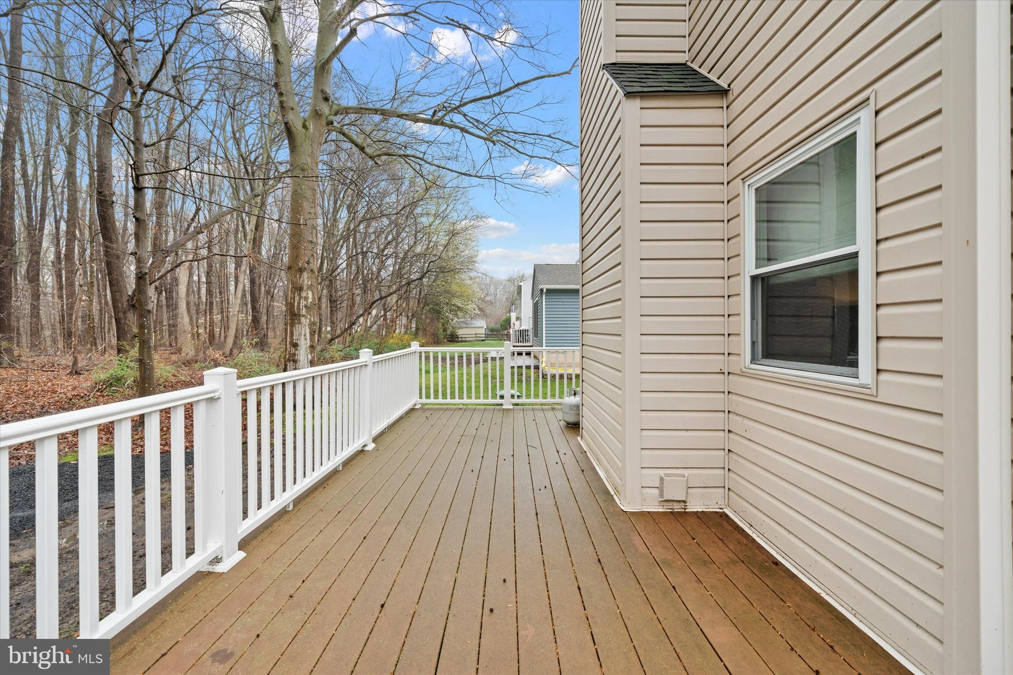 710 Fox Chase Circle Bear, DE 19701 - Photo 28 of 55 a view of a wooden deck with a yard