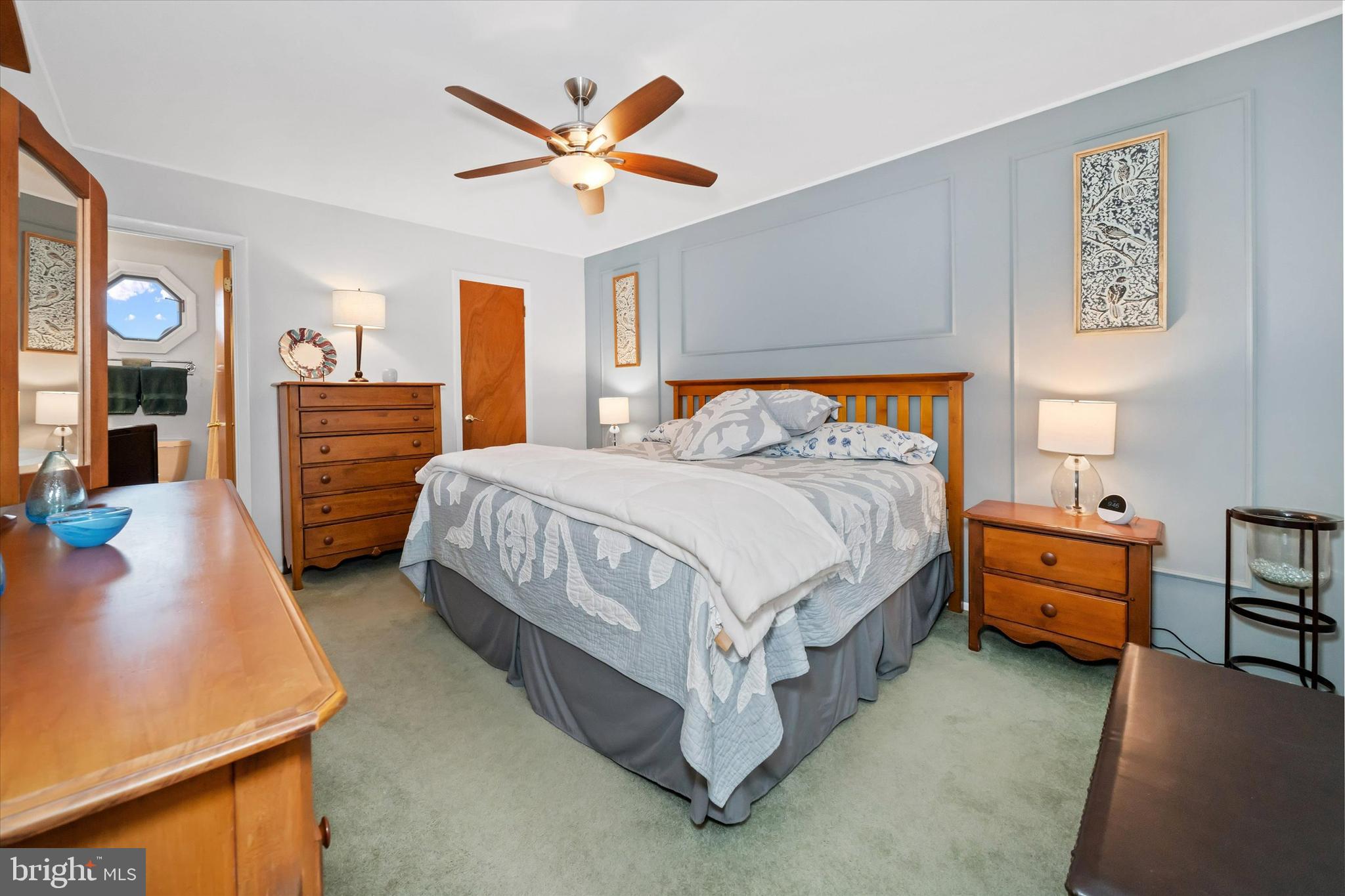 710 Fox Chase Circle Bear, DE 19701 - Photo 29 of 55 a bedroom with a bed and a chandelier